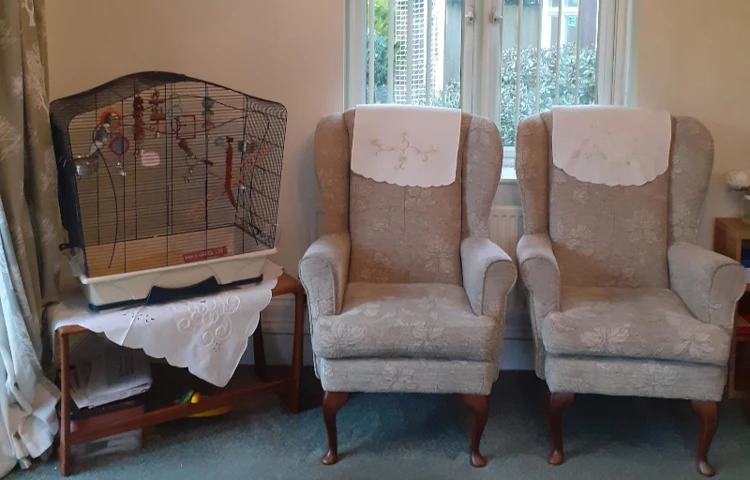 Chairs and a bird cage at Abbeyfield House, Havant PO9 2SS