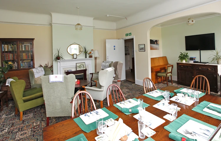 The dining room set for dinner